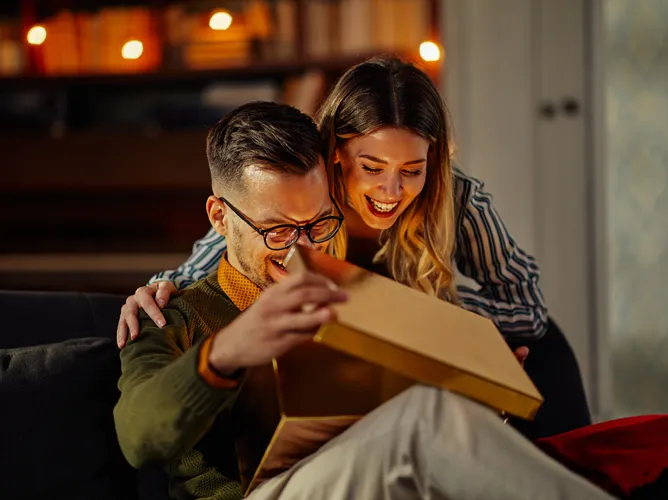 Couple looking at a gift together